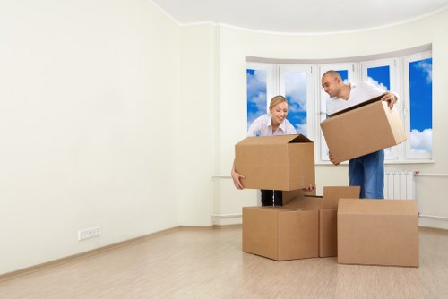 Furniture and boxes prepared for house removals in a Richmond property