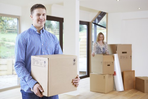 Staff using PPE during a property move