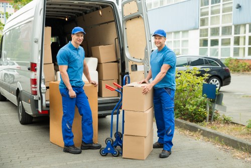 Packed boxes and furniture ready for local transport