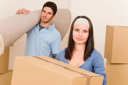 Family moving belongings into secure storage in Richmond Upon Thames
