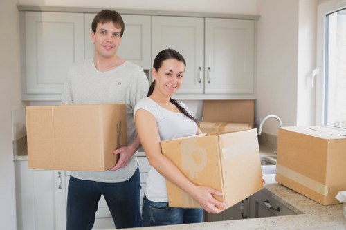 Local movers organising boxes and furniture for a house move in Twickenham